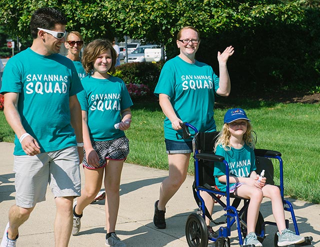 People Walking at Walk Strong to Cure JM Event